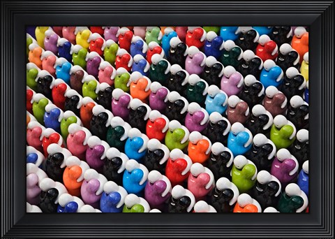 Framed Pattern of glass figures hugging. Outdoor market, Bangkok, Thailand Print