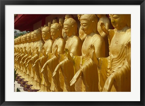 Framed Taiwan, Foukuangshan Temple, Standing gold-colored Buddha statues at a Buddhist shrine Print