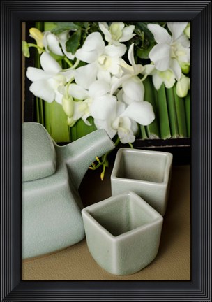 Framed Traditional Thai tea pot and cups with orchid arrangement, Bangkok, Thailand Print