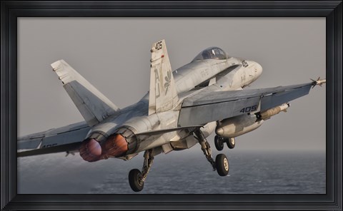 Framed F/A-18C Hornet Taking Off from USS George HW Bush Print