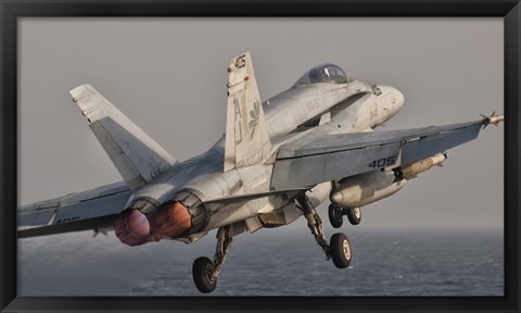 Framed F/A-18C Hornet Taking Off from USS George HW Bush Print