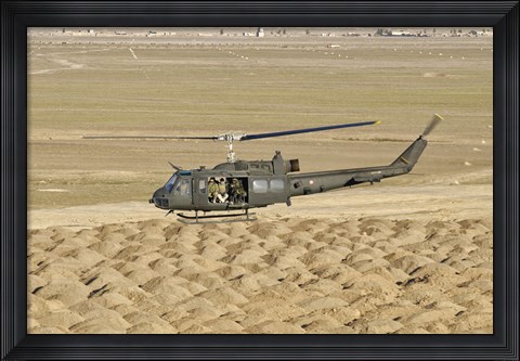 Framed Italian Army AB-205MEP Utility Helicopter Over Shindand, Afghanistan Print