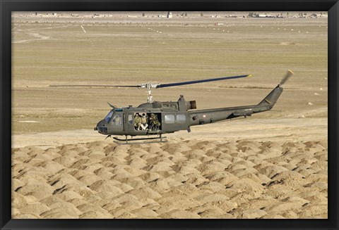 Framed Italian Army AB-205MEP Utility Helicopter Over Shindand, Afghanistan Print