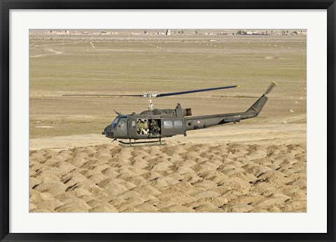 Framed Italian Army AB-205MEP Utility Helicopter Over Shindand, Afghanistan Print