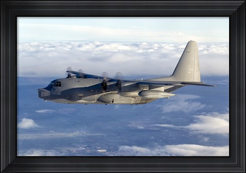 Framed MC-130P Combat Shadow Soars Above the Clouds Print