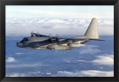 Framed MC-130P Combat Shadow Soars Above the Clouds Print