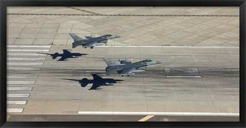 Framed Two F-16&#39;s Land in Formation at Luke Air Force Base, Arizona Print