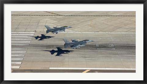 Framed Two F-16&#39;s Land in Formation at Luke Air Force Base, Arizona Print