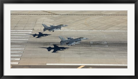 Framed Two F-16&#39;s Land in Formation at Luke Air Force Base, Arizona Print