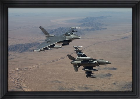 Framed Two F-16&#39;s on a training mission over the Arizona desert Print