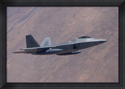 Framed F-22 Raptor on a Training Mission Print