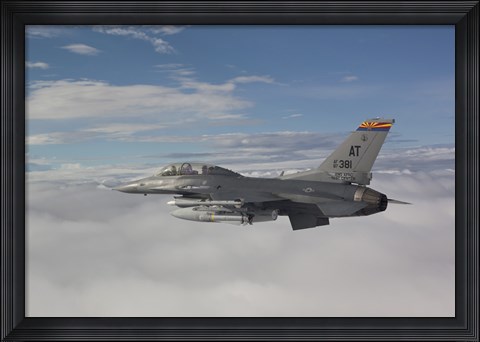 Framed F-16 Fighting Falcon Flies with AGM-65 Maverick Missile Print
