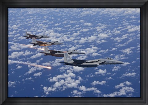 Framed Four F-15 Eagles fly in Formation Over the Pacific Ocean Print