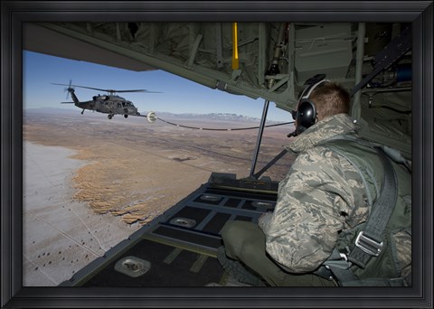 Framed Loadmaster on an HC-130 Watches a HH-60G Pave Hawk Refuel Print