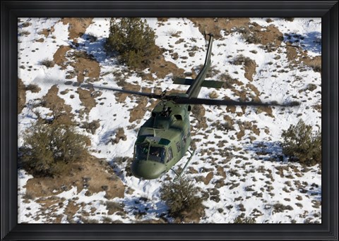 Framed UH-1N Twin Huey over Kirtland Air Force Base, New Mexico Print