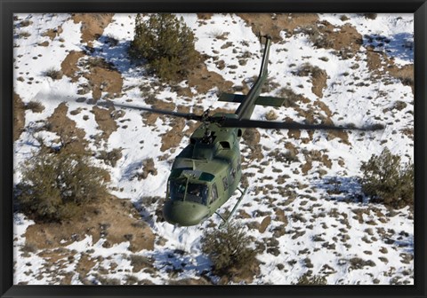 Framed UH-1N Twin Huey over Kirtland Air Force Base, New Mexico Print