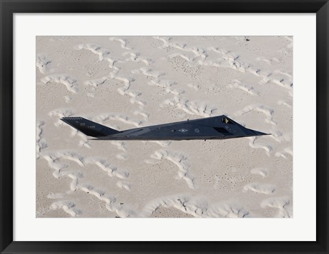 Framed F-117 Nighthawk Flies over White Sands National Monument, New Mexico Print