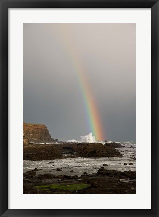 Framed New Zealand, South Island A rainbow arcs over Curio Bay Print