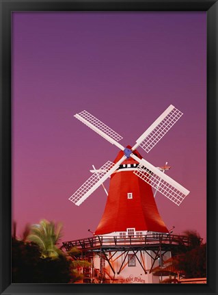 Framed Mill Resort against pink sky, Oranjestad, Aruba Print