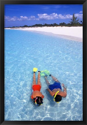 Framed Snorkeling in the blue waters of the Bahamas Print