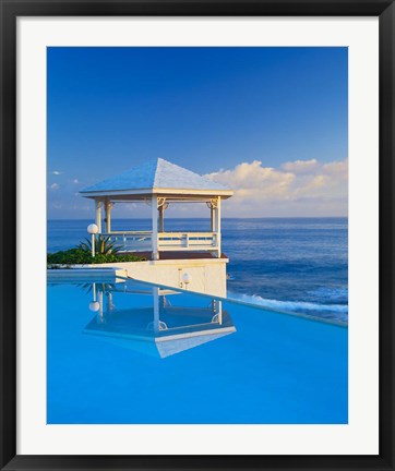 Framed Gazebo reflecting on pool with sea in background, Long Island, Bahamas Print