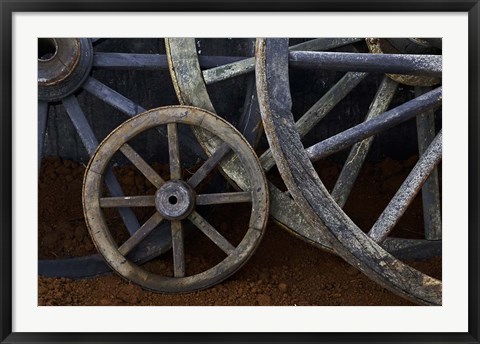 Framed Rustic wagon wheels on movie set, Cuba Print