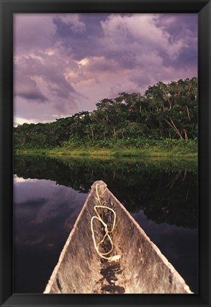 Framed Paddling a dugout canoe on Lake Anangucocha, Yasuni National Park, Amazon basin, Ecuador Print