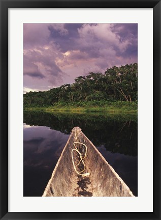 Framed Paddling a dugout canoe on Lake Anangucocha, Yasuni National Park, Amazon basin, Ecuador Print