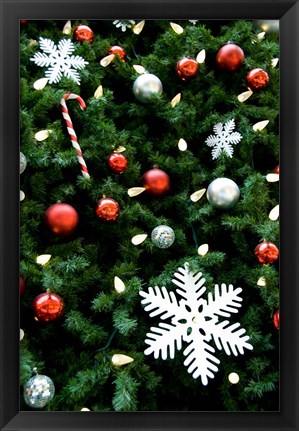 Framed Christmas decorations on tree Print