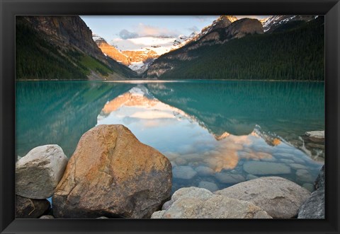 Framed Rocky Mountains and boulders reflected in Lake Louise, Banff National Park, Alberta, Canada Print