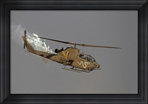 Framed AH-1S Tzefa of the Israeli Air Force dispenses flares Print