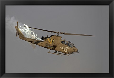Framed AH-1S Tzefa of the Israeli Air Force dispenses flares Print