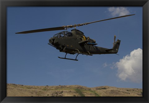 Framed AH-1F Tzefa of the Israeli Air Force flying over the Golan Heights, Israel Print