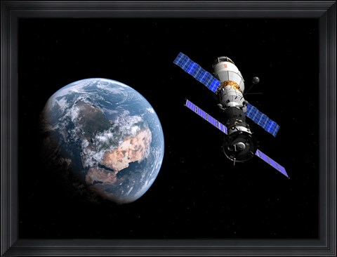 Framed manned Soyuz TMA-M spacecraft docked with an extended stay module Print