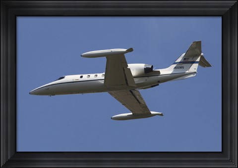 Framed United States Air Forces Europe C-21A Learjet in Flight over Germany Print