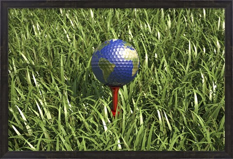 Framed 3D Rendering of an Earth Golf Ball on Tree in the Grass Print