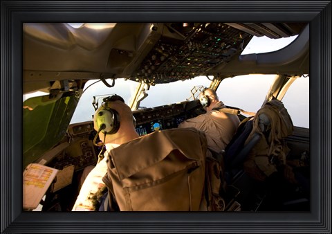 Framed US Army Pilots in-Flight in the Cockpit of a C-17 Globemaster III during a Mission to Qatar Print