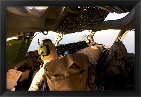 Framed US Army Pilots in-Flight in the Cockpit of a C-17 Globemaster III during a Mission to Qatar Print