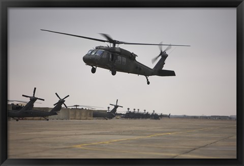 Framed UH-60 Black Hawk Taking off for a Mission Over Northern Iraq Print