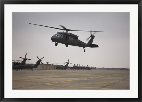 Framed UH-60 Black Hawk Taking off for a Mission Over Northern Iraq Print