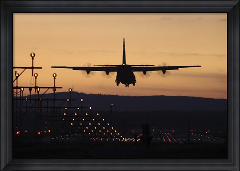 Framed C-130J Super Hercules Landing at Ramstein Air Base, Germany, at Dusk Print