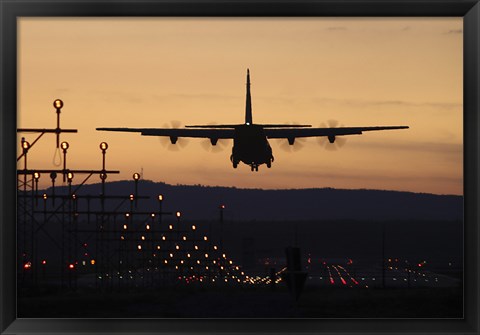 Framed C-130J Super Hercules Landing at Ramstein Air Base, Germany, at Dusk Print