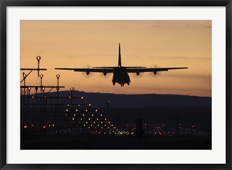 Framed C-130J Super Hercules Landing at Ramstein Air Base, Germany, at Dusk Print