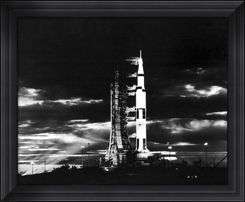 Framed Searchlights Illuminate this Nighttime view of Apollo 17 Spacecraft on its Launchpad Print