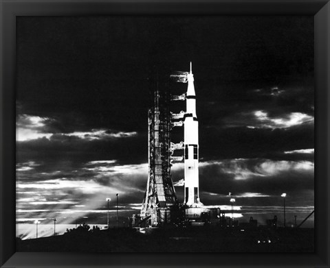 Framed Searchlights Illuminate this Nighttime view of Apollo 17 Spacecraft on its Launchpad Print