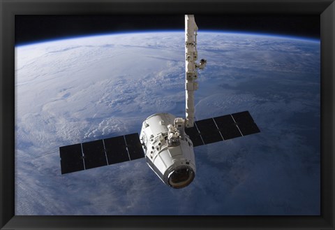 Framed SpaceX Dragon Cargo Craft Prior to being Released from the Canadarm2 Print