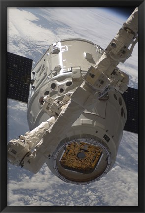 Framed SpaceX Dragon Commercial Cargo Craft during Grappling Operations with Canadarm2 Print