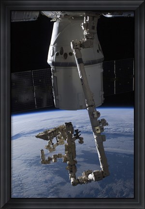 Framed SpaceX Dragon Commercial Cargo Craft Berthed to the ISS Print