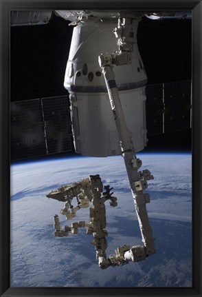 Framed SpaceX Dragon Commercial Cargo Craft Berthed to the ISS Print