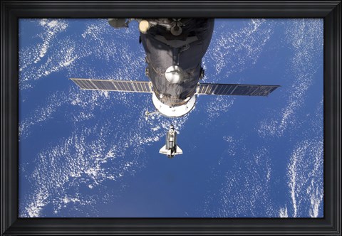 Framed Space Shuttle Discovery approaches the International Space Station Print